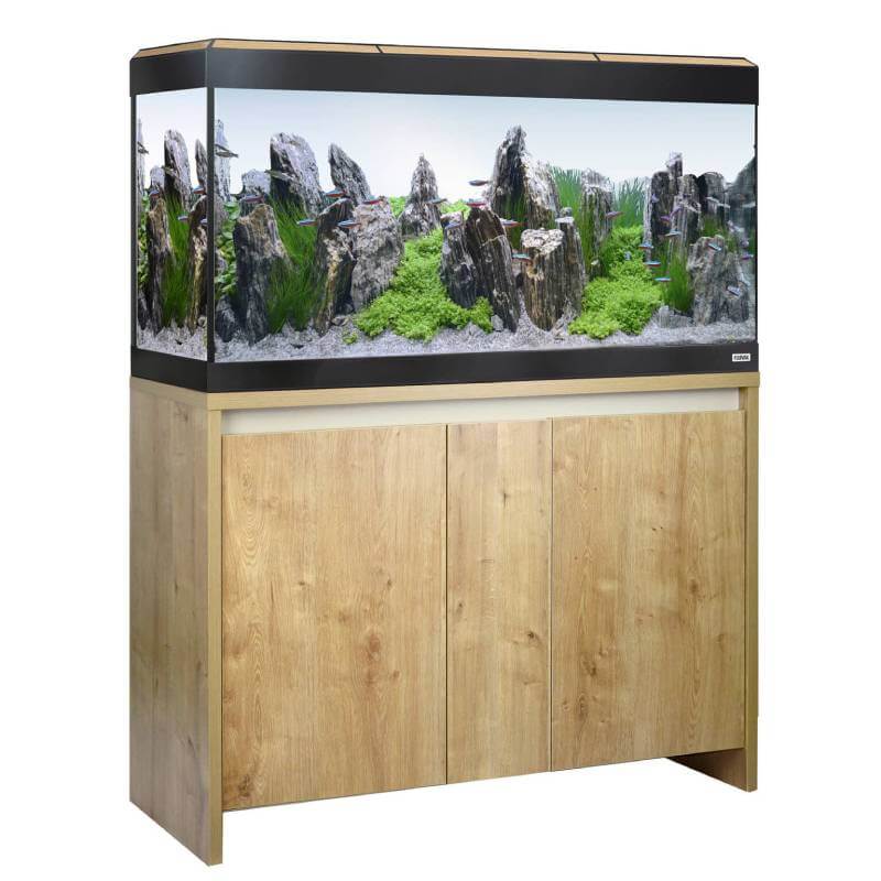 A Fluval Roma LED Aquarium Fish Tank Only by Fluval with Bluetooth LED lighting on a wooden stand.