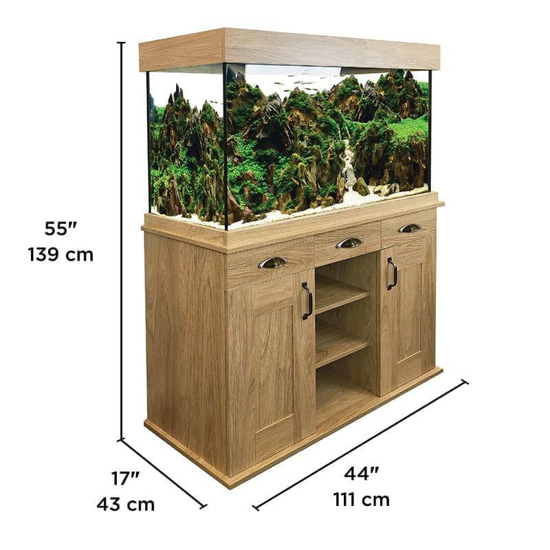 Fluval Shaker 252L Aquarium & Cabinet by Fluval, displayed with a potted plant and floor lamp.