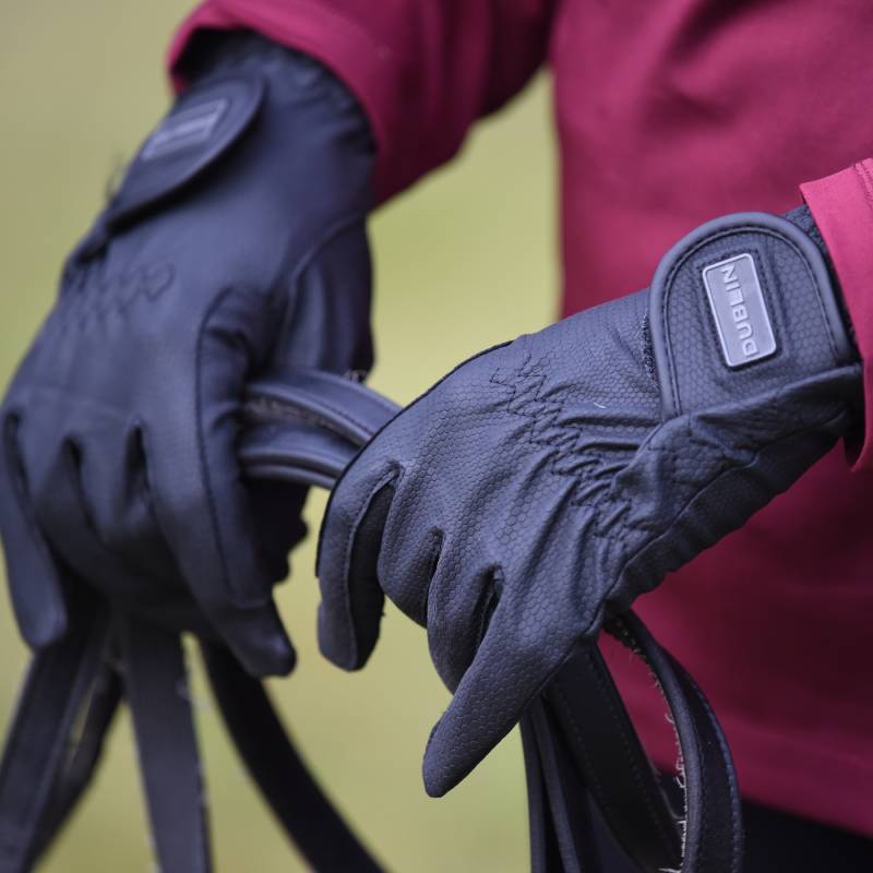 Wearing Dublin Everyday Touch Screen Riding Gloves, DUBLIN logo visible on the strap.