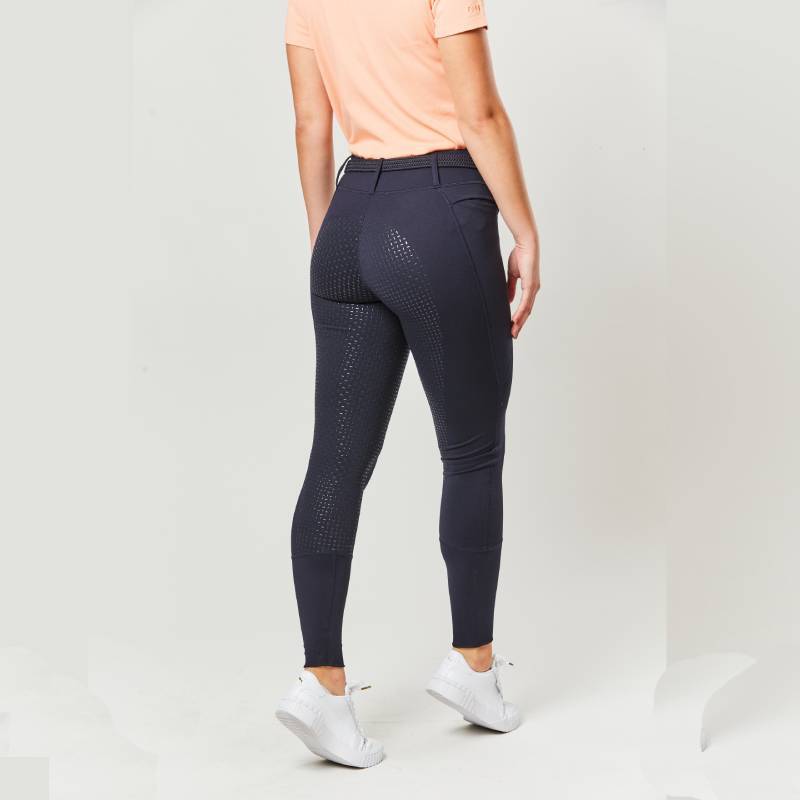 Child wearing Dublin Cool It Everyday Riding Tights in True Navy, shown from the back.