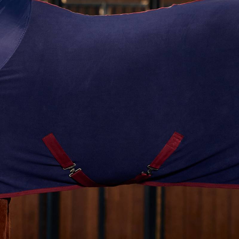 Close-up of Weatherbeeta Anti-Static Fleece Cooler in Navy/Burgundy against wood background.