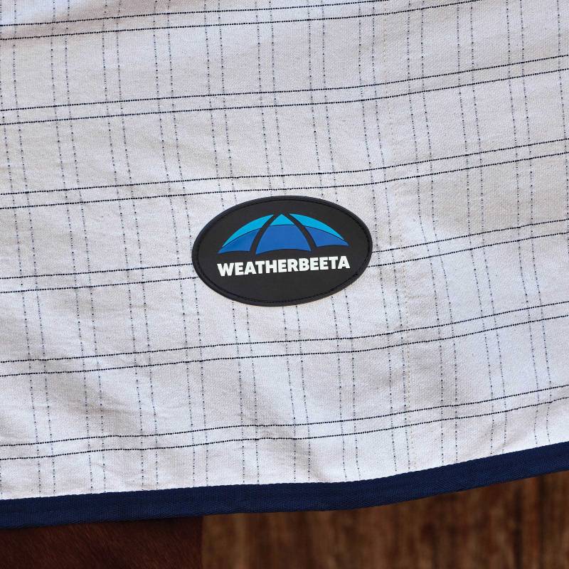 White/Navy Weatherbeeta Comfitec cotton sheet liner with blue brand logo patch sewn on.