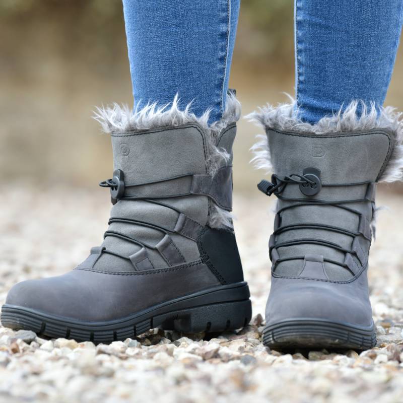 Dublin Boyne Boots Grey Adult by Dublin, styled with blue jeans on a gravel surface.