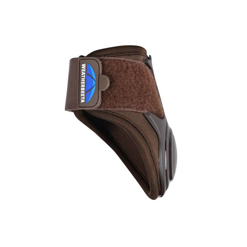 Close-up of Weatherbeeta Tough-Tec Essential Fetlock Boots Brown on horse's legs standing on gravel.