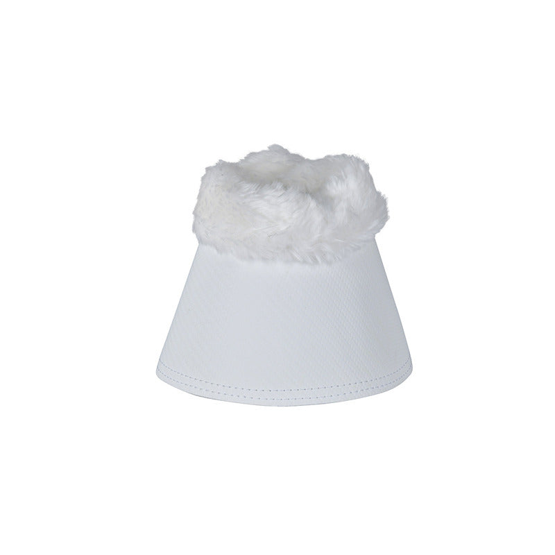 White Weatherbeeta bell boots with fleece trim and a cone shape, like a stylish lampshade.