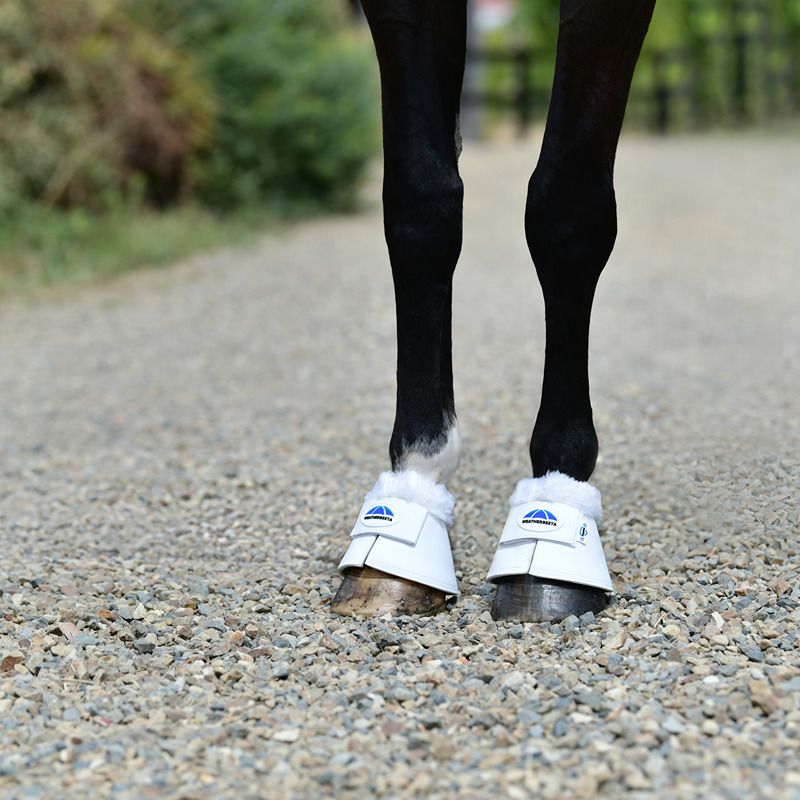 Weatherbeeta Tough-Tec Fleece Trim Bell Boots White for horse overreach protection.