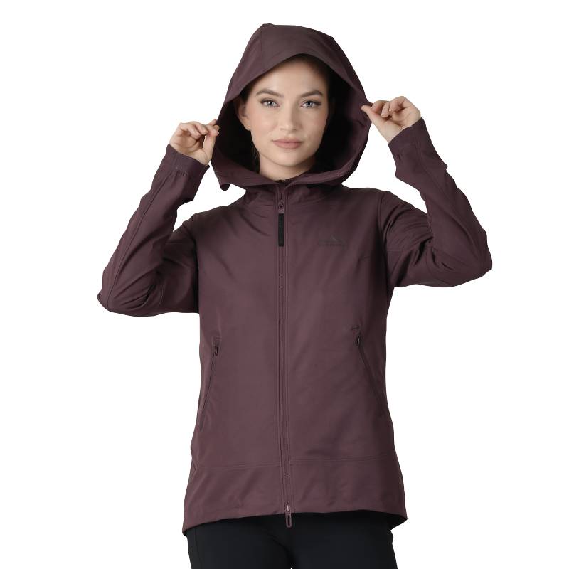 Woman in a Weatherbeeta Abrasion Proof Stretch Riding Jacket Mulberry holding the hood.
