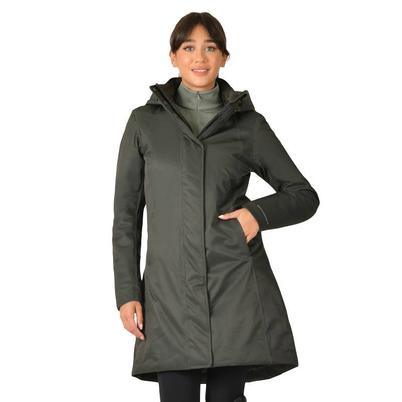 Woman wears a Weatherbeeta All Purpose Waterproof Longline Jacket in Midnight Green.