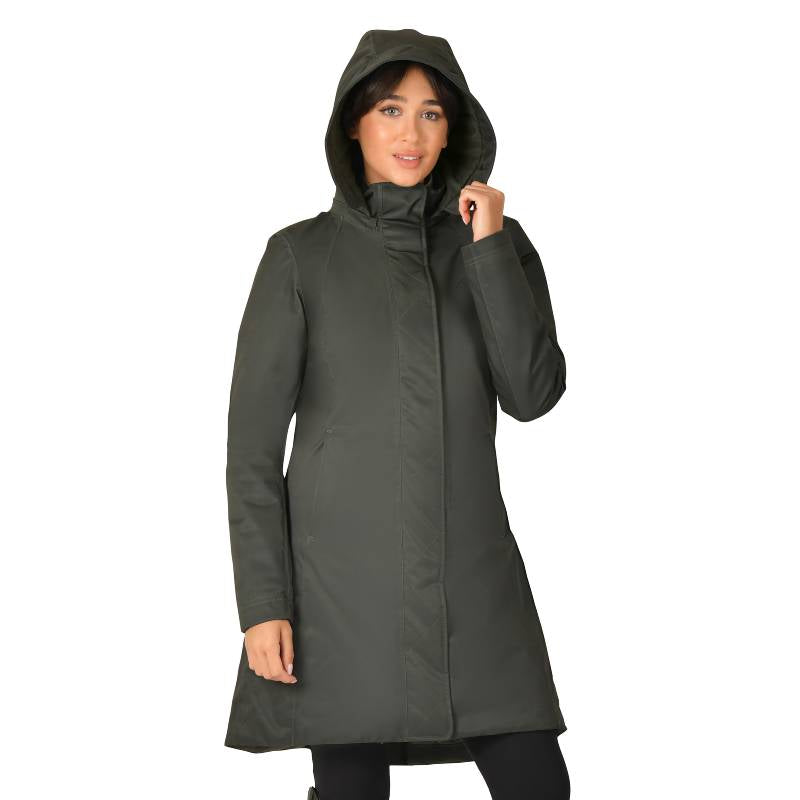 Woman smiling in a Weatherbeeta All Purpose Waterproof Longline Jacket in Midnight Green.
