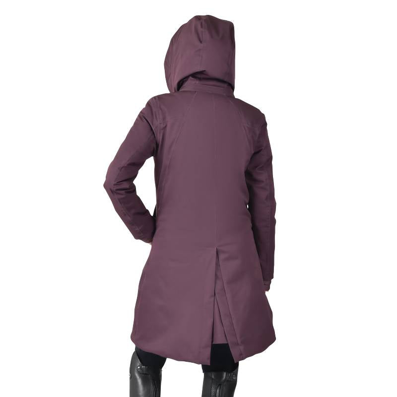 Person wearing a Weatherbeeta All Purpose Longline Equestrian Jacket in Mulberry, hood up.