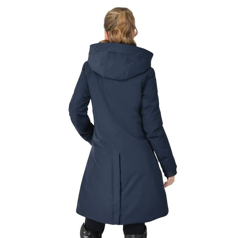Woman in Weatherbeeta All Purpose Waterproof Longline Jacket, navy, hands in pockets.