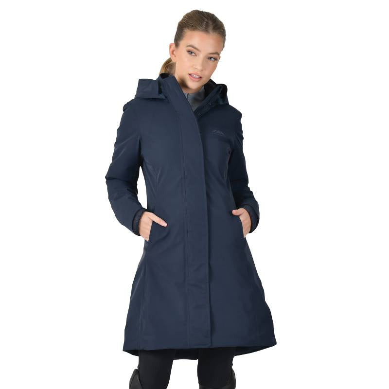 Woman in a Weatherbeeta All Purpose Waterproof Longline Equestrian Jacket, Navy.