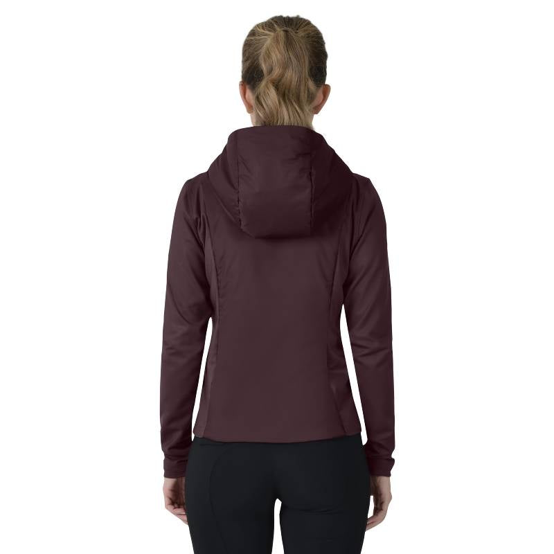 Woman in a Weatherbeeta Hybrid Padded Jacket Mulberry and black pants, shown from the back.