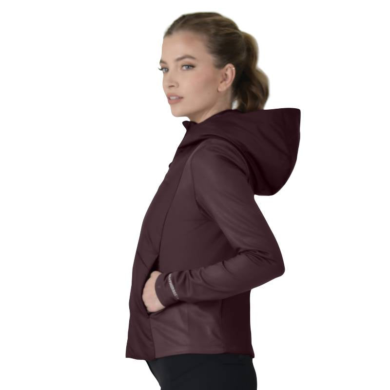 Woman in a Weatherbeeta Hybrid Padded Jacket Mulberry standing sideways against a plain background.