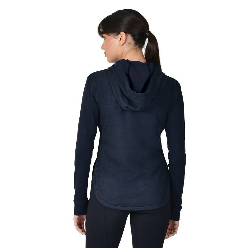 Woman in Weatherbeeta London Layer Long Sleeve Top With Hood, Dark Navy Marle, facing away.