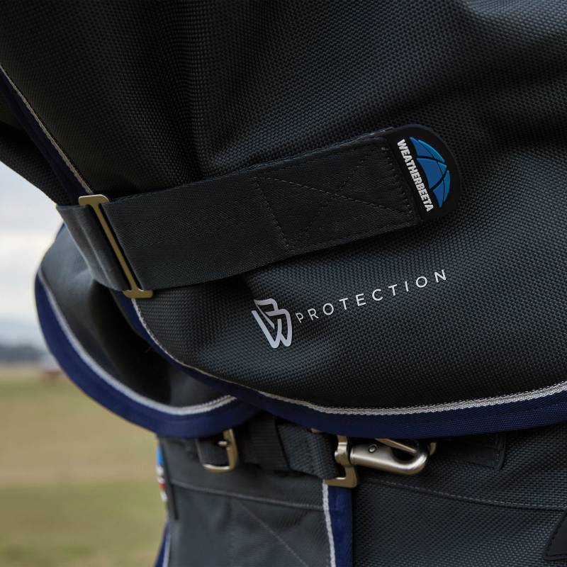Close-up of a WB PROTECTION strap on a Weatherbeeta Comfitec Ultra Detach-A-Neck Turnout Rug.