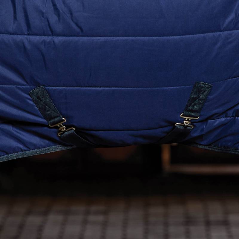 Close-up of Weatherbeeta Comfitec Under Rug Combo Neck 220g Navy with metal belly strap buckles.