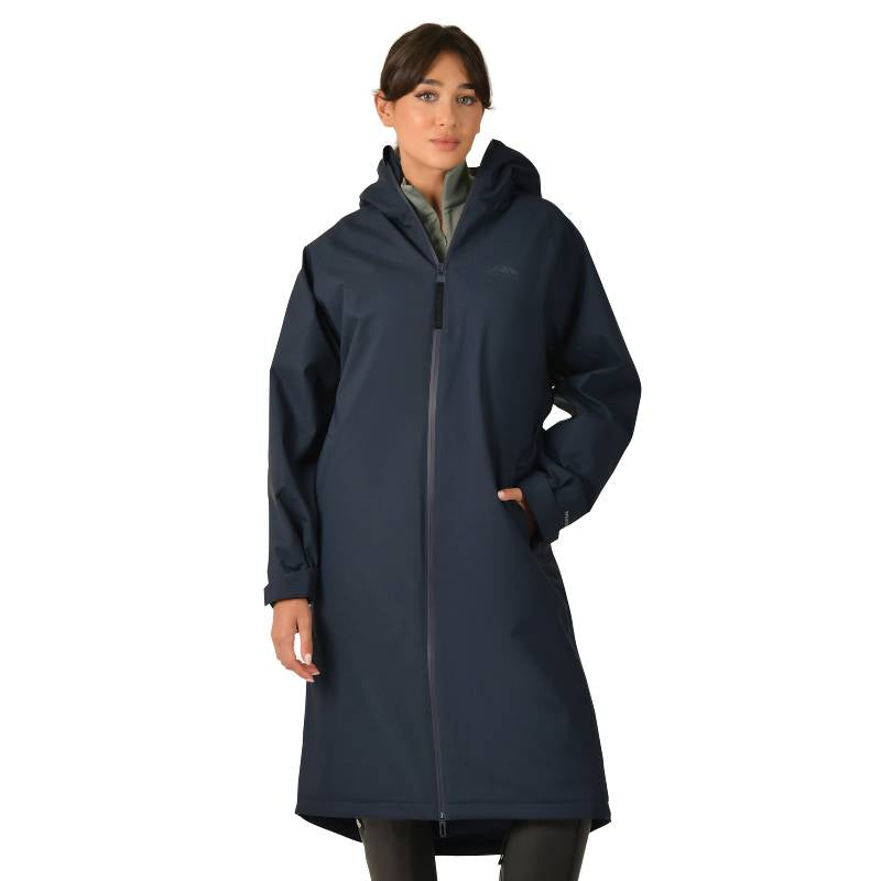Woman in a Weatherbeeta All Weather Field Jacket Navy, hands in pockets, facing forward.