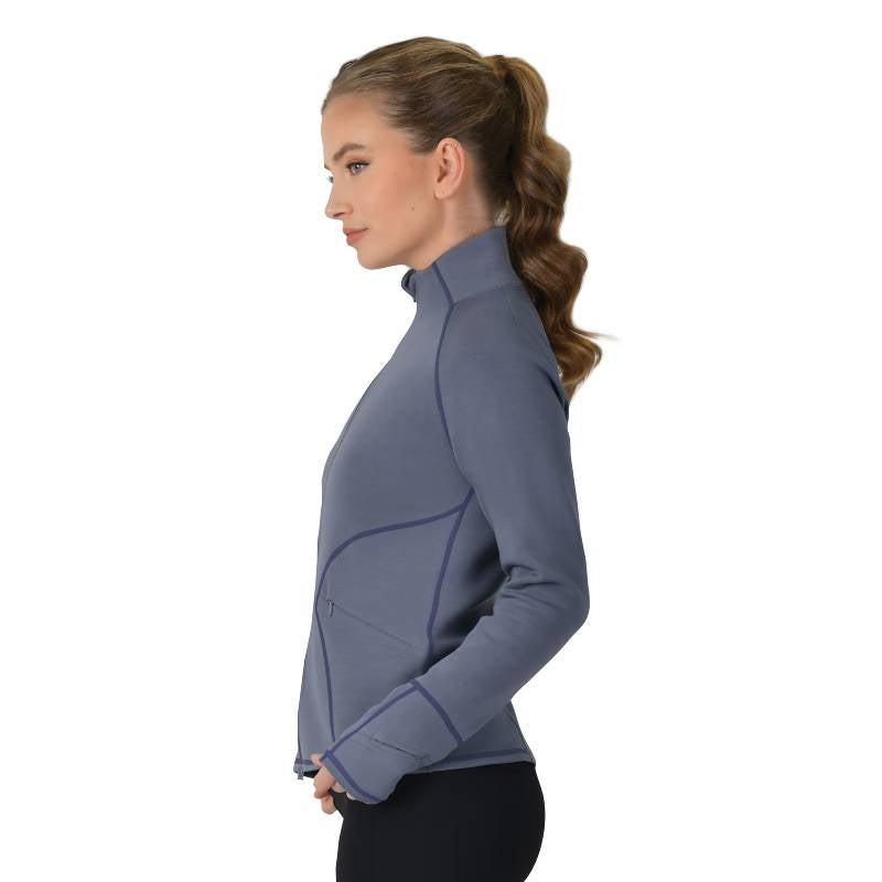 Woman in a Weatherbeeta Copper Performance Jacket Slate Blue, in profile with ponytail.
