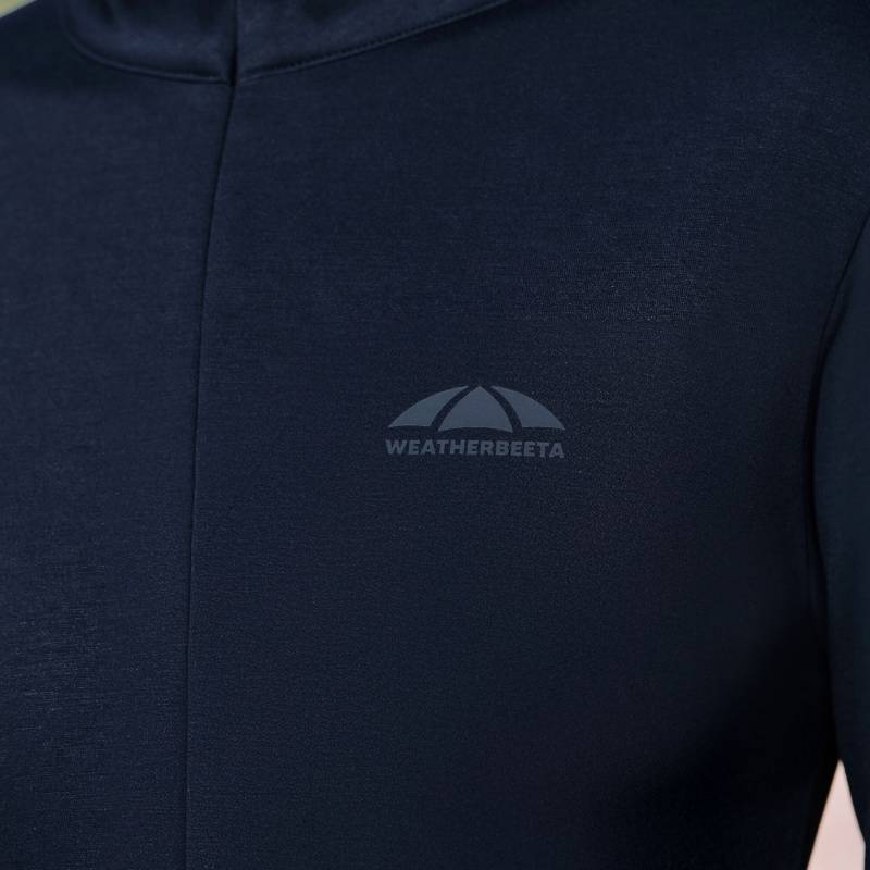 Close-up of Weatherbeeta logo on Copper 1/2 Zip Navy Mid-Layer chest.