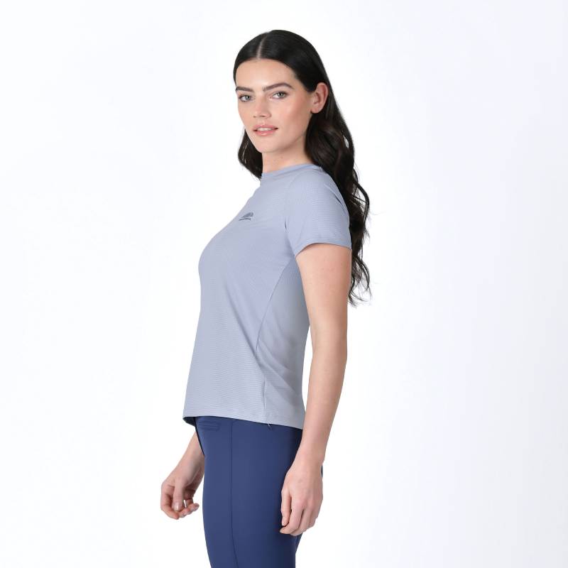 Woman with long dark hair in a Weatherbeeta Relaxed UV Short Sleeve Tee Blue Stone, sideways.