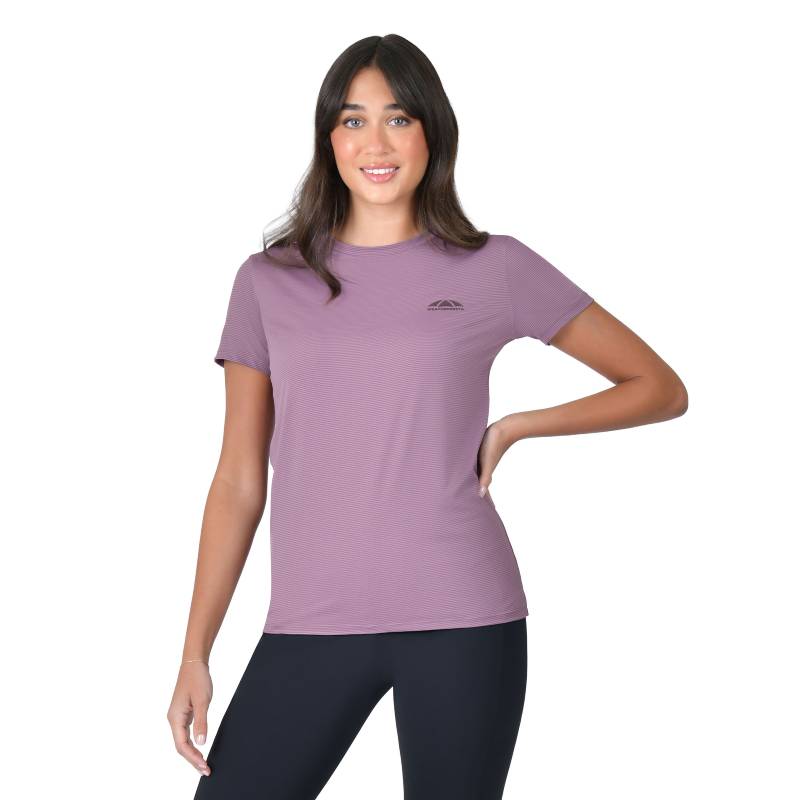 Woman in a Weatherbeeta Relaxed UV Short Sleeve Tee Mauve Wine, standing and smiling confidently.