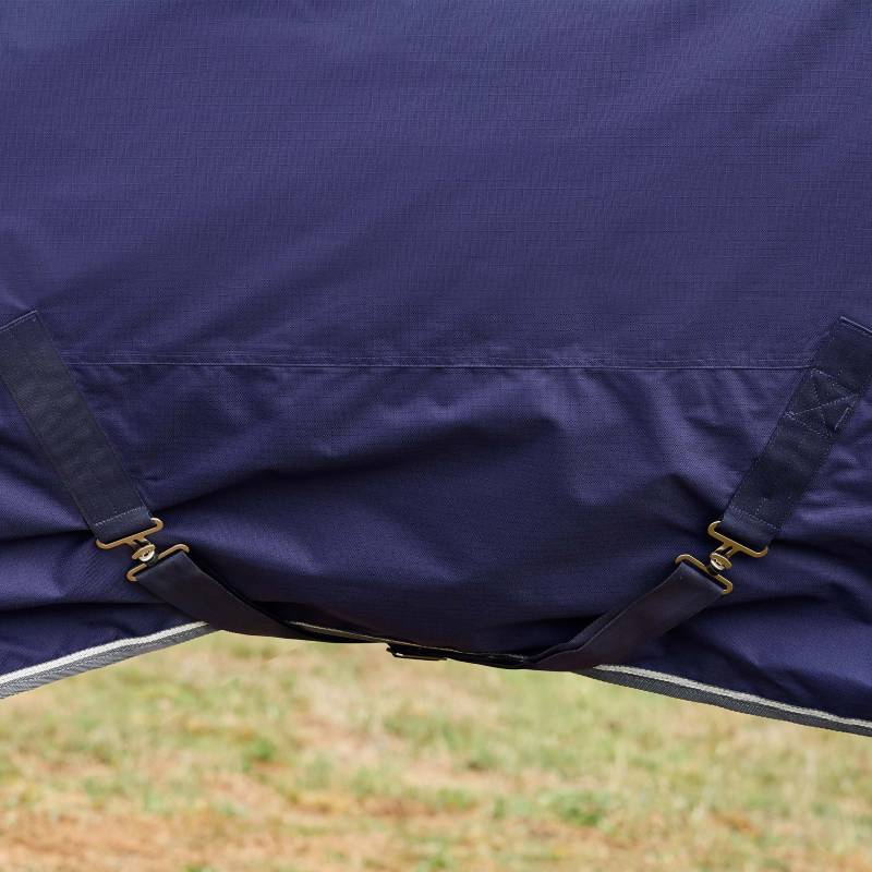 Weatherbeeta Comfitec Tyro Combo Neck Turnout Rug 360g Navy/Charcoal on grass.