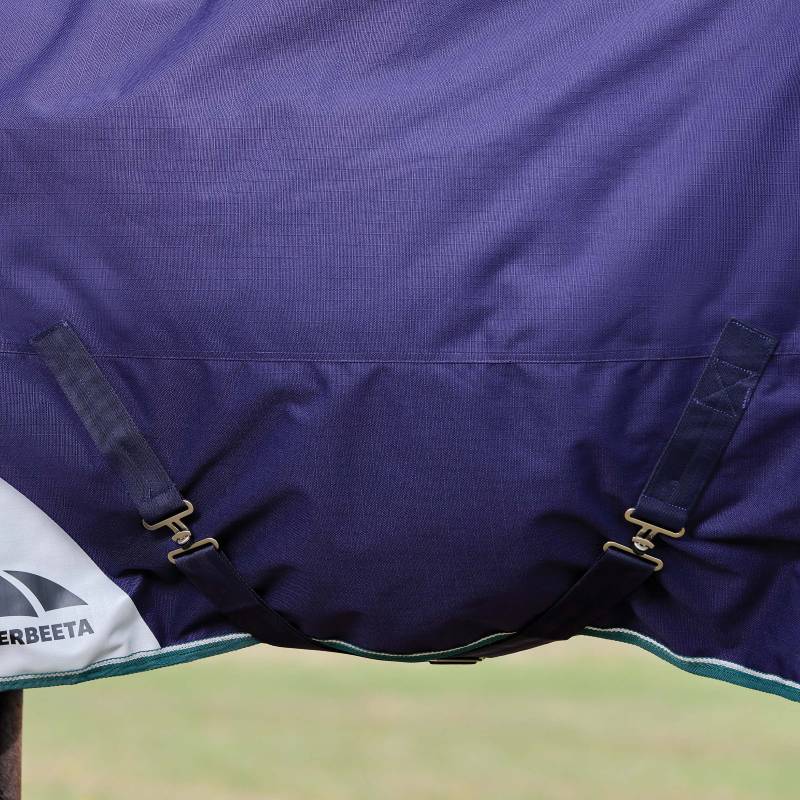 Close-up of the Weatherbeeta Comfitec Plus Dynamic Turnout Rug 0g in navy/forest green.