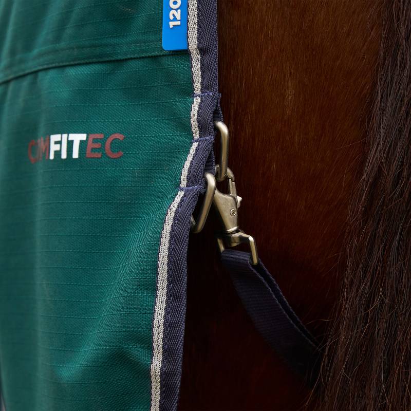 Close-up of a Weatherbeeta ComFiTec Plus Dynamic Medium Weight Turnout Rug in Forest Green/Navy.