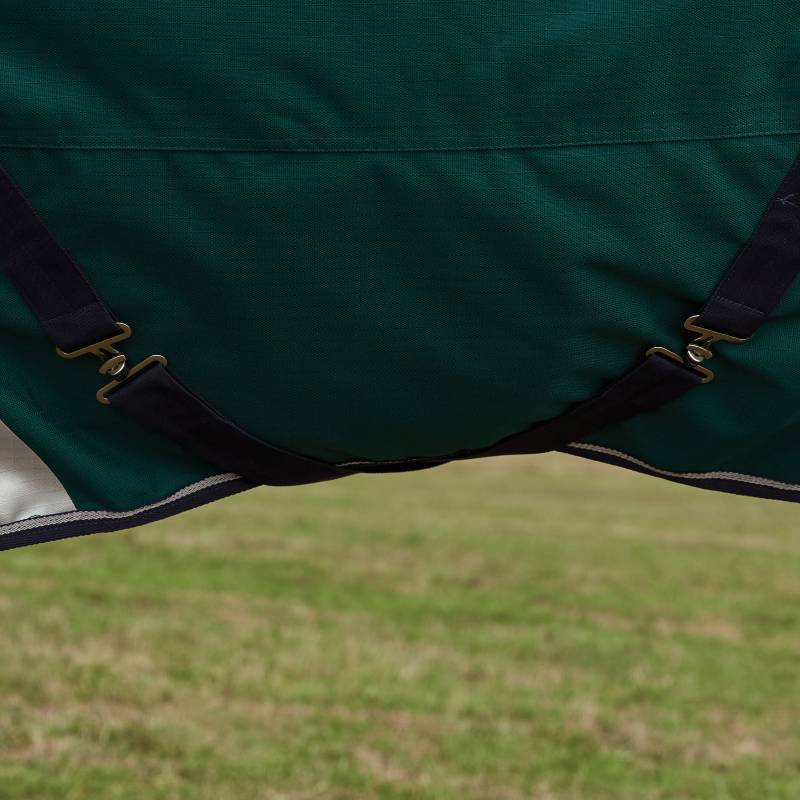 Close-up of green straps and buckles on Weatherbeeta ComFiTec Plus Dynamic Medium Turnout Rug.