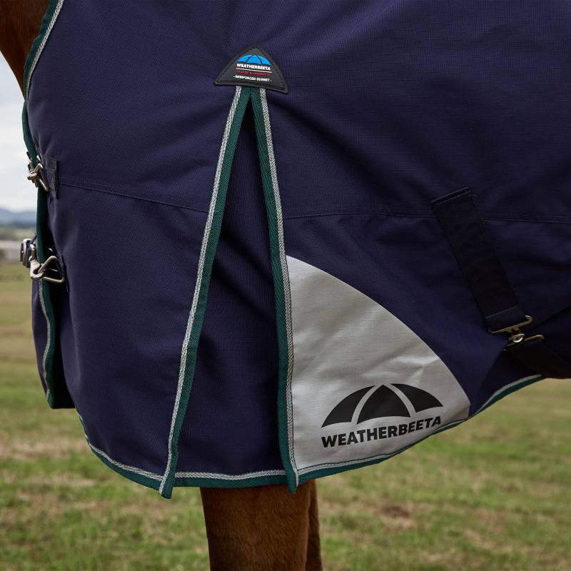 Close-up of a horse in a Weatherbeeta Comfitec Plus Dynamic High Neck Rug, Navy/Forest Green.