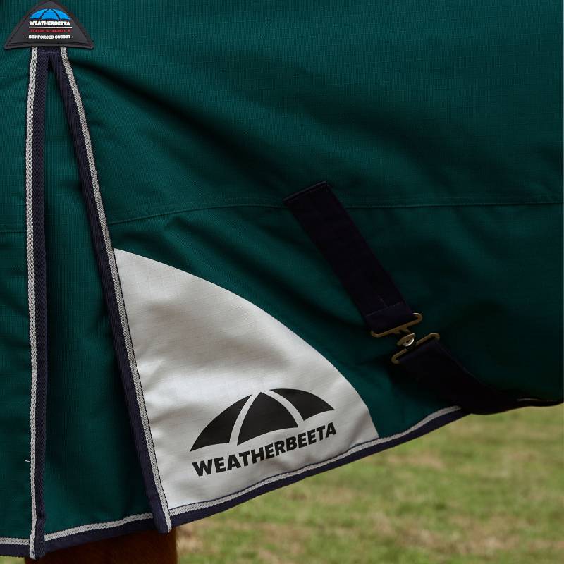 Close-up of Weatherbeeta Comfitec Plus Dynamic 100g turnout rug in forest green/navy.