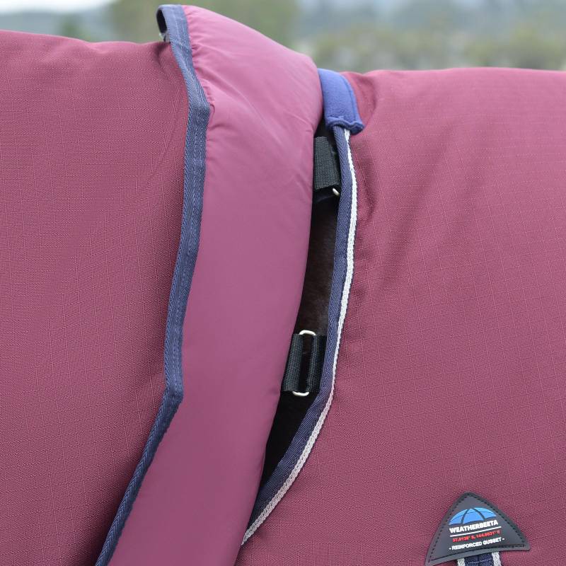 Close-up of a Weatherbeeta Comfitec Essential Detach-A-Neck Rug in Burgundy/Navy with buckle.