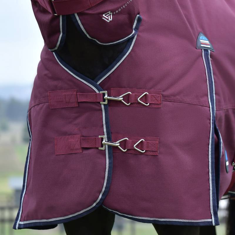 Weatherbeeta Comfitec Essential 220g combo neck rug in burgundy/navy on a horse.