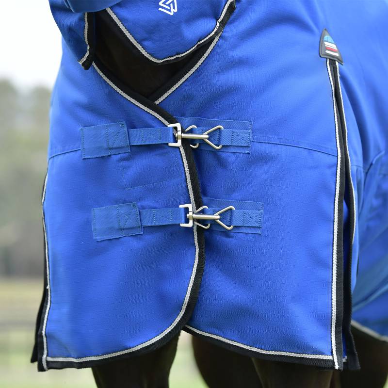 Close-up of a Weatherbeeta Comfitec Essential Combo Neck 220g rug in cobalt/black on a horse.