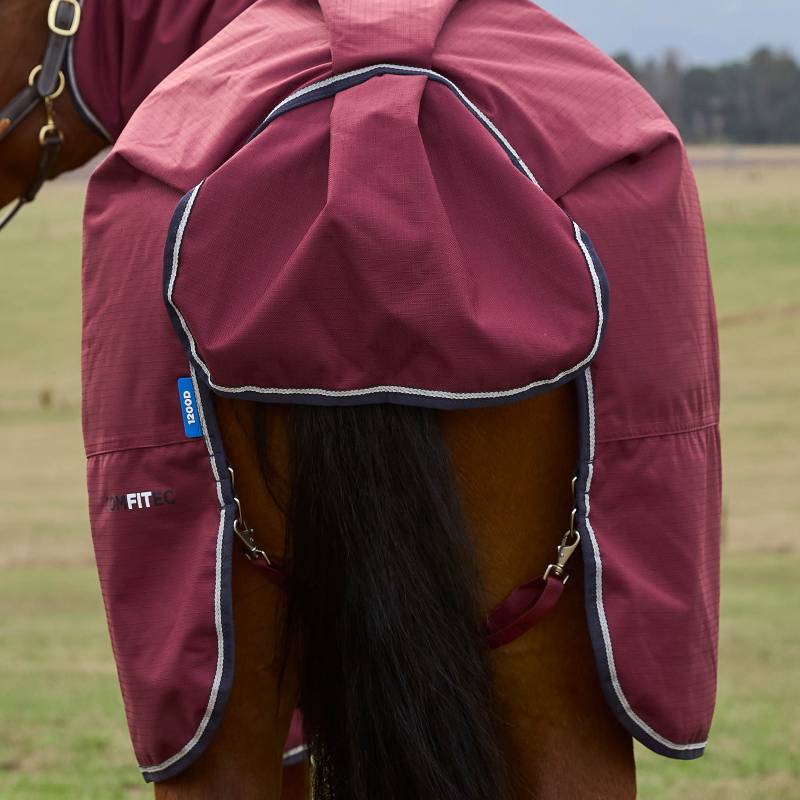 A horse in a burgundy Weatherbeeta Comfitec Prelim Combo Neck Turnout Rug 220g.