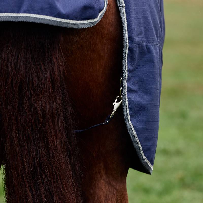 Close-up of a horse in a Weatherbeeta Comfitec Tyro Turnout Rug Standard Neck 50g Navy/Charcoal.