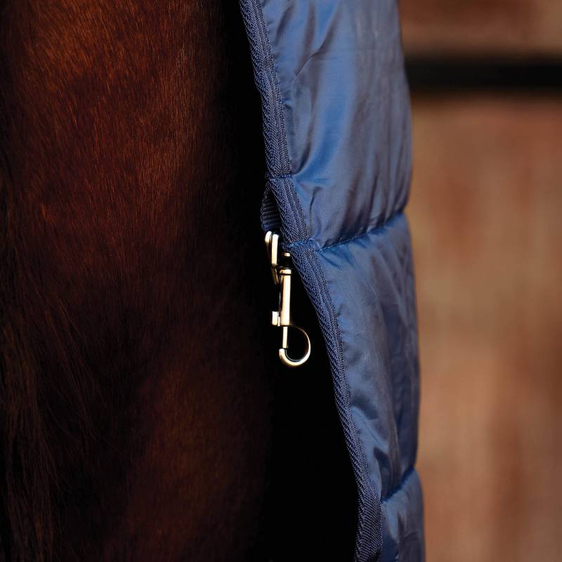 Close-up of a Weatherbeeta Comfitec Medium Weight Liner Navy 200g on a horse.