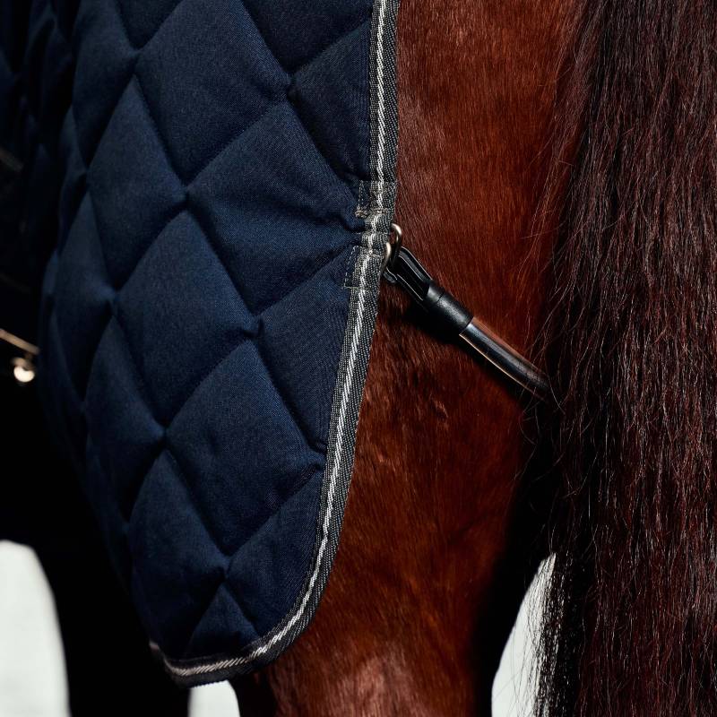 Weatherbeeta Comfitec 1000D navy/charcoal rug on a chestnut horse with silver trim.