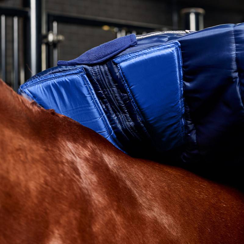 Close-up of a Weatherbeeta Comfitec PP Channel Quilt Stable Rug 220g Navy/Charcoal on a horse.
