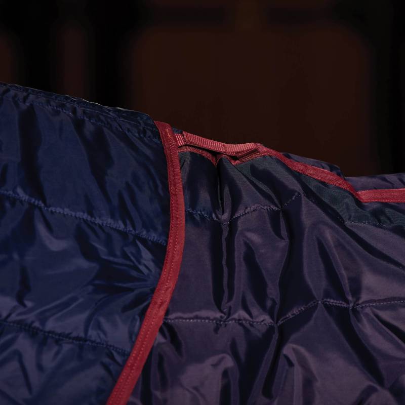 Close-up of Weatherbeeta Comfitec 210D Channel Quilt Stable Rug Combo in Navy/Burgundy.