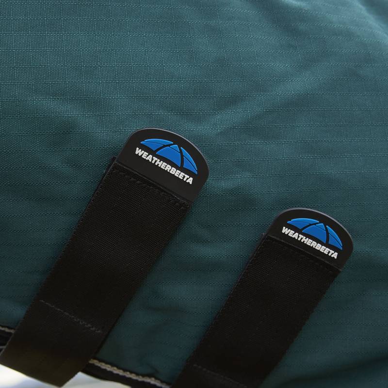 Close-up of Weatherbeeta Comfitec Classic Combo Neck Turnout Rug with two black chest straps.