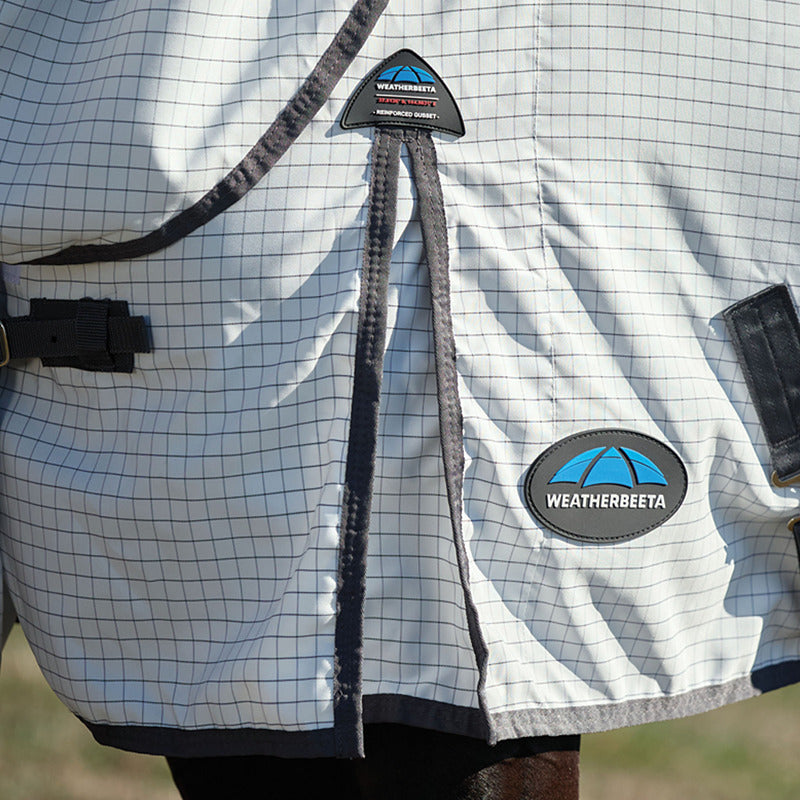 Close-up of Weatherbeeta Hybrid Sheet Combo Neck Rug, lightweight 600D in white/charcoal.