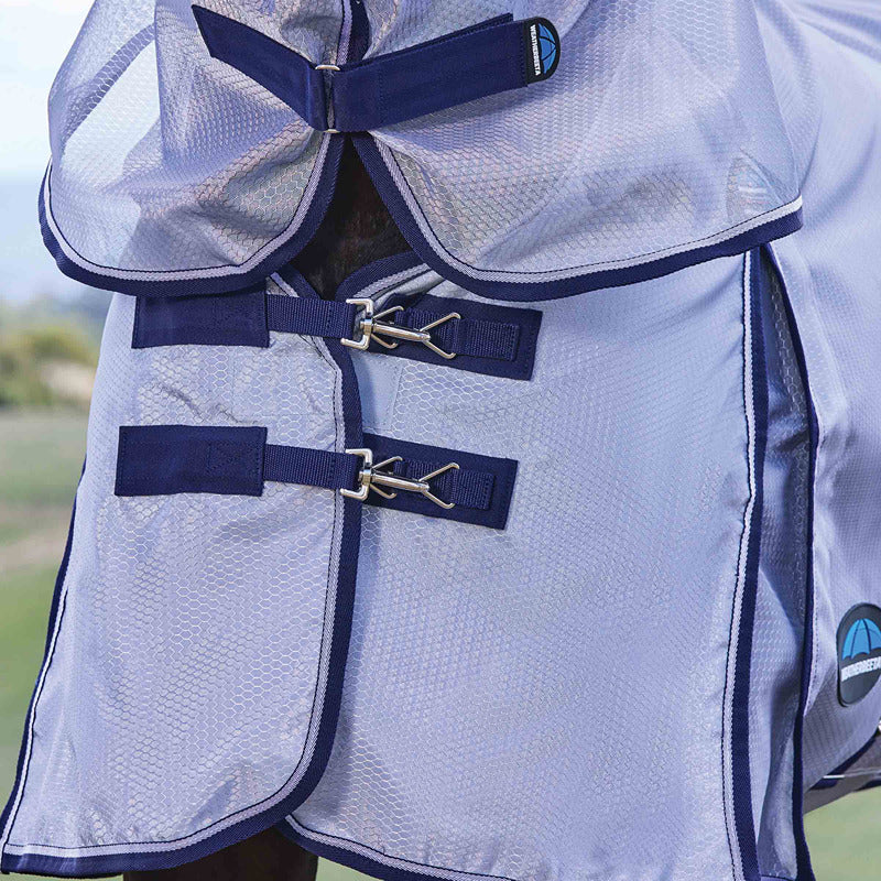 Close-up of a horse in a Weatherbeeta Comfitec Hexi Shield Combo Neck Fly Rug Silver/Navy/White.