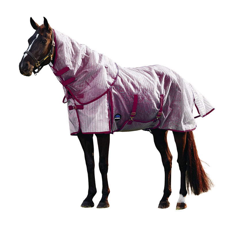 A dark horse in a Weatherbeeta Comfitec Ripshield Fly Rug stands against a white background.