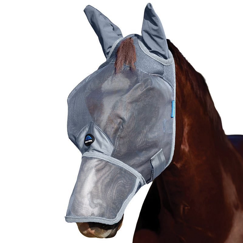 A horse outdoors wears a Weatherbeeta mesh fly mask with ears & nose for UV protection.