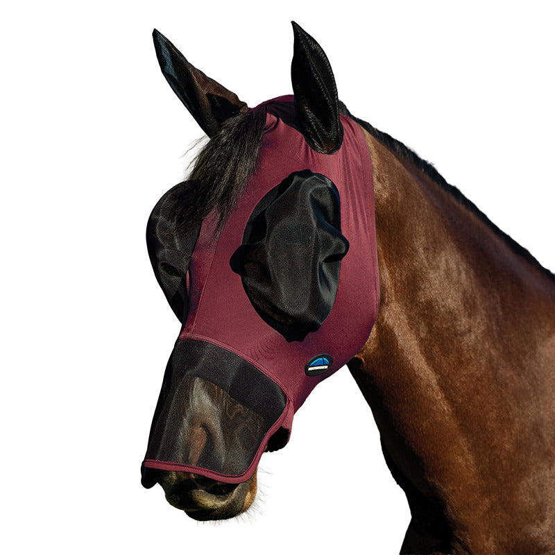 A brown horse outdoors wears a Weatherbeeta Burgundy/Black Luxe Fly Mask for UV protection.