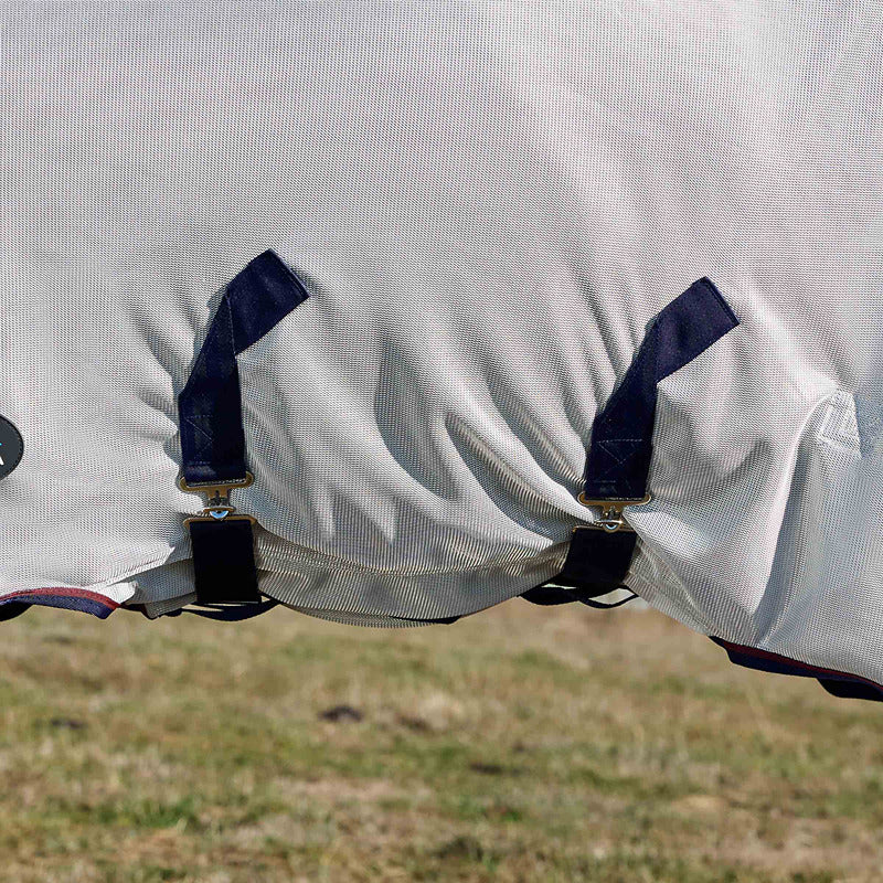 Weatherbeeta Comfitec Airflow rug straps clipped, grass in background.