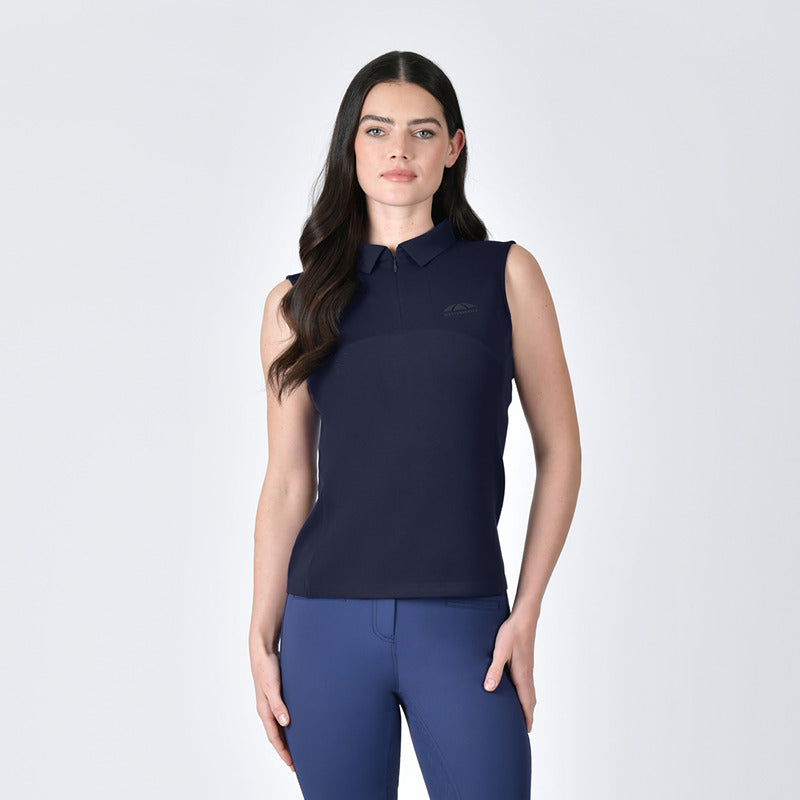 Woman wears Weatherbeeta 37.5 Sleeveless Performance Polo Navy, standing against a plain background.