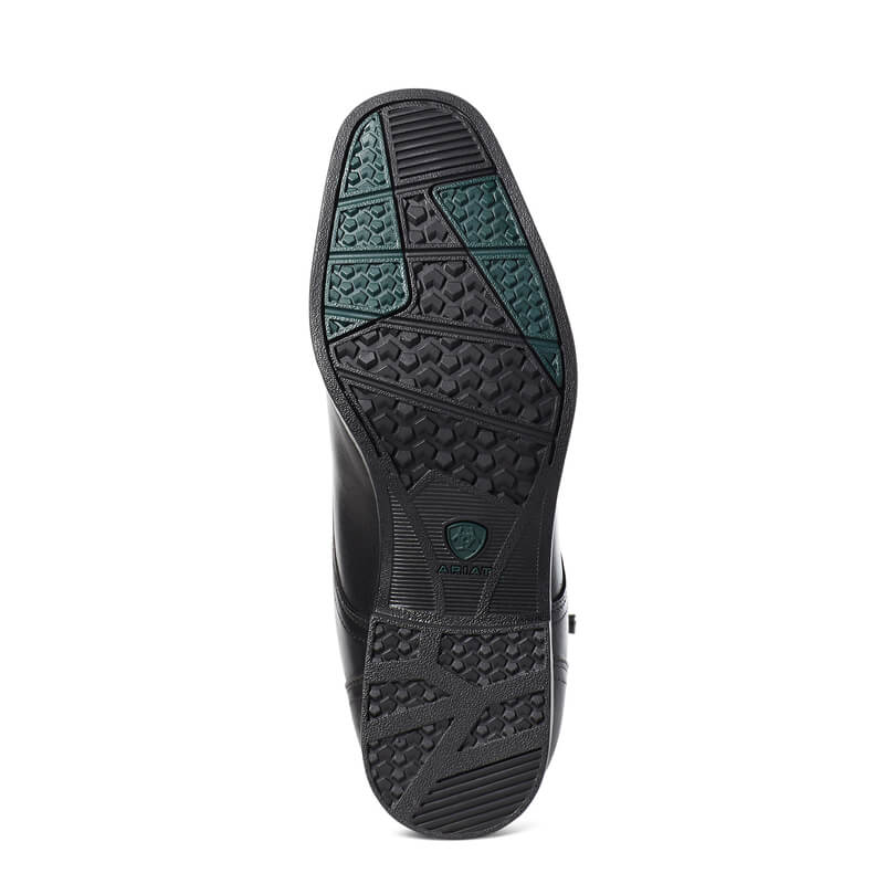 Ariat Palisade black boots feature a textured sole, green accents, and a shield logo.